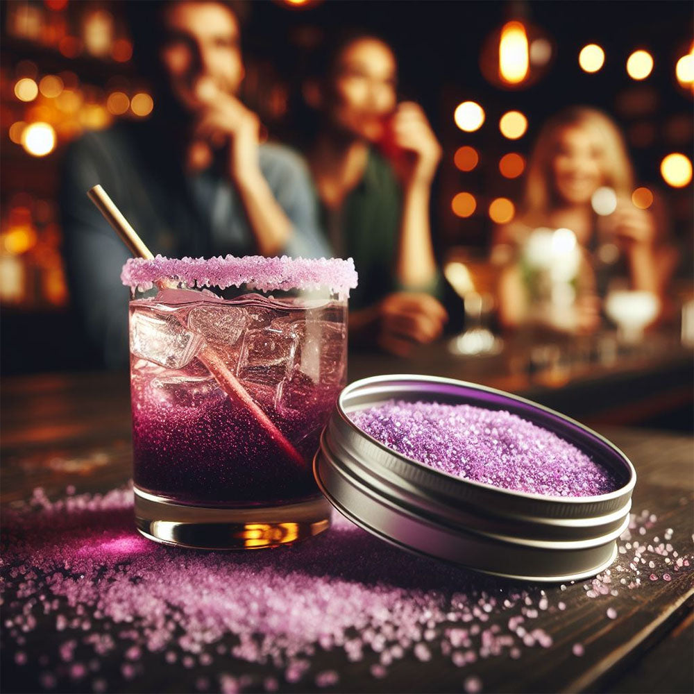 rum and coke cocktail with purple rimming salts